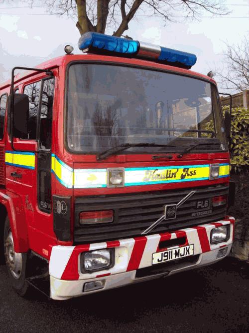 Chauffeur driven Fire Engine red limousine with real firemen for hire in North West, Cheshire, Liverpool, Manchester, Bolton, Chester, Wigan, Lancashire, Preston, Stockport and Blackburn.