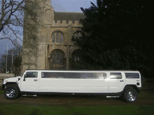 Chauffeur driven stretched white H2 hummer limousine 16 seater in East of England, Peterborough, Huntingdon, Stanford, King's Lynn, Norwich, Great Yarmouth, Lowestoft, Wisbech, Spalding, Cambridge, Cambridgeshire, Bedford, Bedfordshire, Newmarket, Bury St Edmunds, Suffolk, Norfolk, Lincolnshire, Northampton, Northamptonshire, Kettering, Leicester and Sudbury.