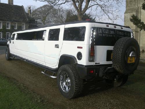 Chauffeur driven stretch white H2 hummer limo 16 seater in East of England, Peterborough, Huntingdon, Stanford, King's Lynn, Norwich, Great Yarmouth, Lowestoft, Wisbech, Spalding, Cambridge, Cambridgeshire, Bedford, Bedfordshire, Newmarket, Bury St Edmunds, Suffolk, Norfolk, Lincolnshire, Northampton, Northamptonshire, Kettering, Leicester and Sudbury.