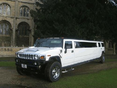 Chauffeur stretch white H2 hummer limousine 16 seater in East of England, Peterborough, Huntingdon, Stanford, King's Lynn, Norwich, Great Yarmouth, Lowestoft, Wisbech, Spalding, Cambridge, Cambridgeshire, Bedford, Bedfordshire, Newmarket, Bury St Edmunds, Suffolk, Norfolk, Lincolnshire, Northampton, Northamptonshire, Kettering, Leicester and Sudbury.