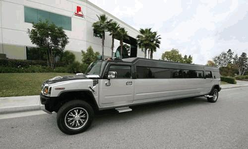 Chauffeur stretched chrome and black 6ft tall H2 hummer limo in Manchester, Liverpool, Cheshire, Chester, Stockport, North West, Blackburn, Preston, Bolton, Wigan, Lancashire.