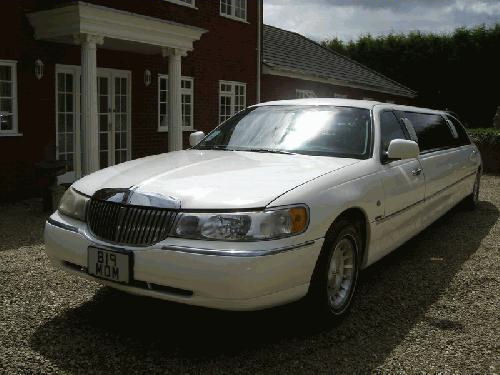 Chauffeur driven stretch white Lincoln Millenium Town Car limo 8 seater with TV, DVD and Mirror bar in East of England, Peterborough, Huntingdon, Stanford, King's Lynn, Norwich, Great Yarmouth, Lowestoft, Wisbech, Spalding, Cambridge, Cambridgeshire, Bedford, Bedfordshire, Newmarket, Bury St Edmunds, Suffolk, Norfolk, Lincolnshire, Northampton, Northamptonshire, Kettering, Leicester and Sudbury.