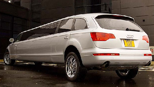 Chauffeur stretched silver Audi Q7 limousine hire in Glasgow, Edinburgh, Scotland.