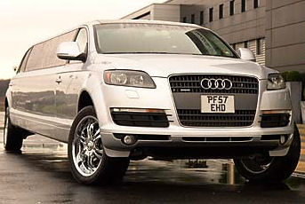 Chauffeur stretched silver Audi Q7 Sport limousine hire in Glasgow, Edinburgh, Scotland.