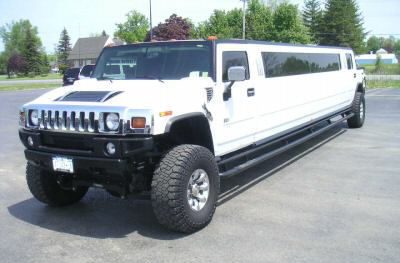 Chauffeur stretched white Hummer H2 limo hire in Portsmouth, Southampton, Bournemouth, Brighton, Poole, Hampshire, Sussex, Surrey, South Coast