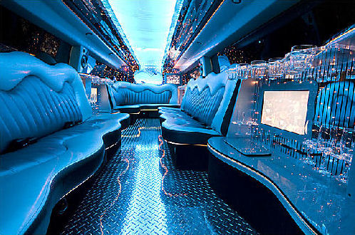 Chauffeur stretch black Hummer H2 limo hire in Glasgow, Edinburgh, Aberdeen, Dundee, Scotland