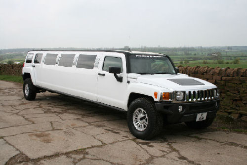 Chauffeur stretched white Hummer H2 limousine hire in London, Berkshire, Surrey, Buckinghamshire, Hertfordshire, Essex, Kent, Hampshire, Northamptonshire