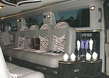 Chauffeur stretched white Hummer limousine hire interior in Carlisle, Workington, Penrith, Barrow-in-Furness, Kendal, Whitehaven, Durham, Cumbria