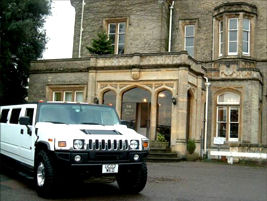 Chauffeur stretched silver Hummer limousine hire in Birmingham, Coventry, Dudley, Wolverhampton, Telford, Worcester, Walsall, Stafford