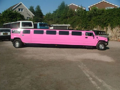 Chauffeur stretch pink Hummer H2 limousine hire in Bristol, Gloucester, Cheltenham, Cardiff, Wales, Weston Super Mare, and Bath.