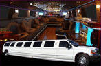 Chauffeur stretch white Ford Excursion 4x4 limousine hire in UK