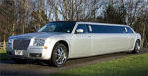 Chauffeur stretched silver Chrysler C300 Baby Bentley limo hire in Glasgow, Edinburgh, Scotland.