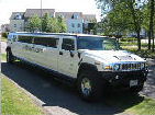 Chauffeur stretch black Hummer H2 limo hire in Liverpool, Manchester, Bolton, Warrington, North West