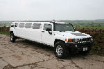 Chauffeur stretched white Hummer H2 limousine hire in London, Berkshire, Surrey, Buckinghamshire, Hertfordshire, Essex, Kent, Hampshire, Northamptonshire