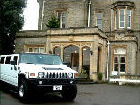 Chauffeur stretched silver Hummer limousine hire in Birmingham, Coventry, Dudley, Wolverhampton, Telford, Worcester, Walsall, Stafford