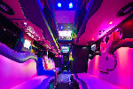 Chauffeur driven Party Bus limo hire Playboy den interior in Bristol, Gloucester, Cheltenham, Cardiff, Wales, Weston Super Mare, and Bath.