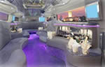 Chauffeur stretched pink Hummer H2 limo hire interior in UK