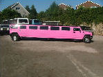 Chauffeur stretch pink Hummer H2 limousine hire in Bristol, Gloucester, Cheltenham, Cardiff, Wales, Weston Super Mare, and Bath.