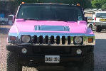 Chauffeur stretched pink Hummer H2 limo hire in Bristol, Gloucester, Cheltenham, Cardiff, Wales, Weston Super Mare, and Bath.